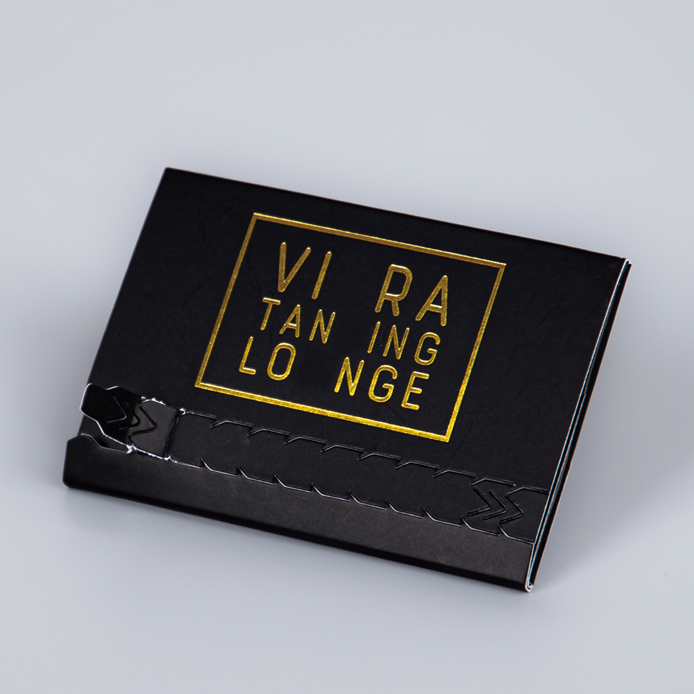 The first sense of ceremony for members is hidden inside this tear-open card box