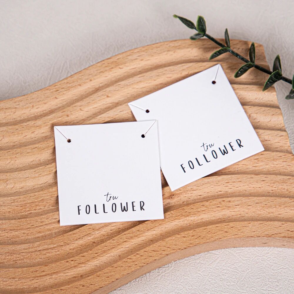 Set against the backdrop of elegant little cards, each piece of jewelry is imbued with a gentle, poetic charm.
