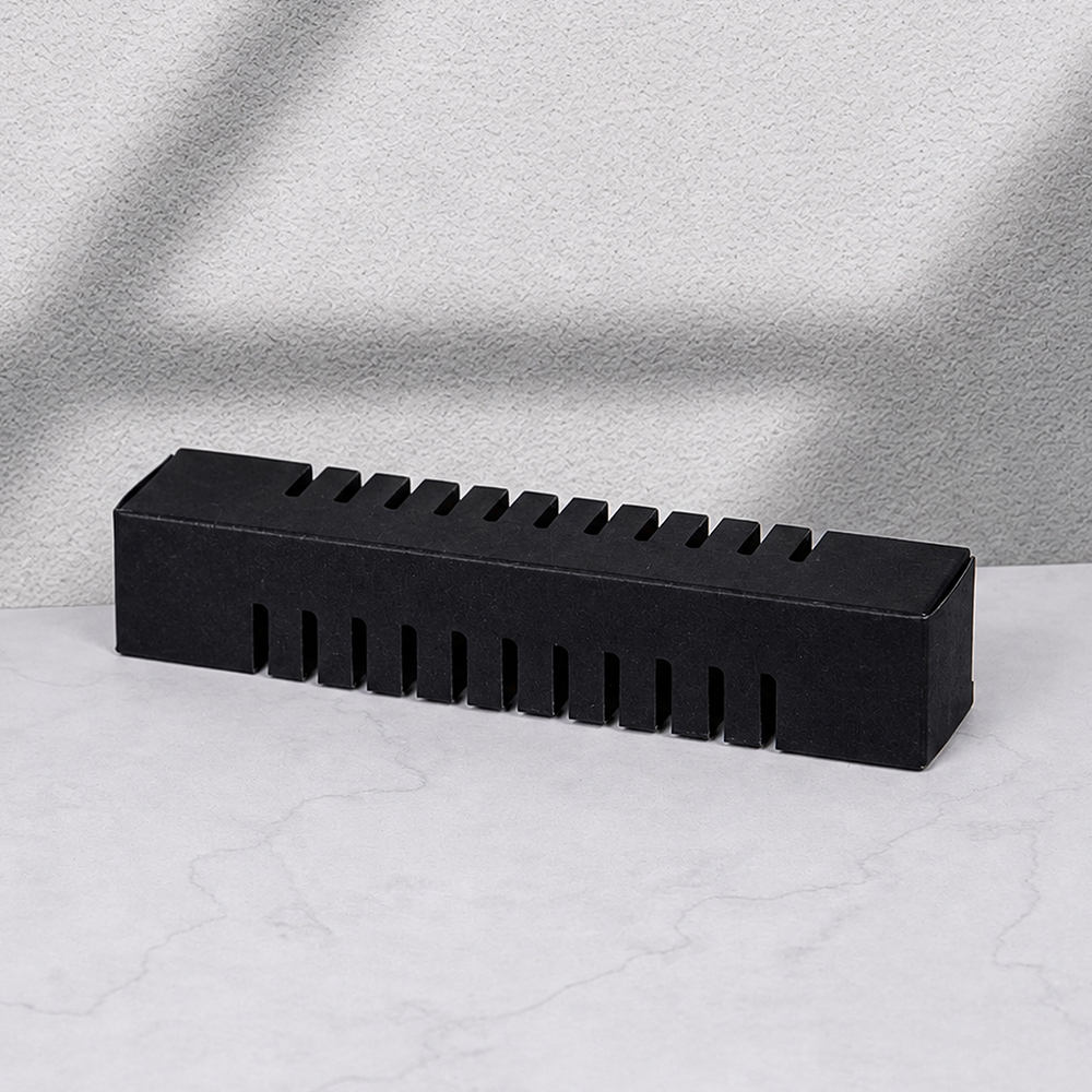 **The Understated Beauty of a Black Comb-Tooth Card Holder**